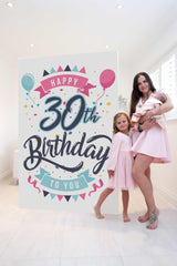 Mother, daughter and baby posing with giant Custom Birthday Mega Card