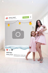mother and 2 daughters posing with giant Christmas Instagram Style Card
